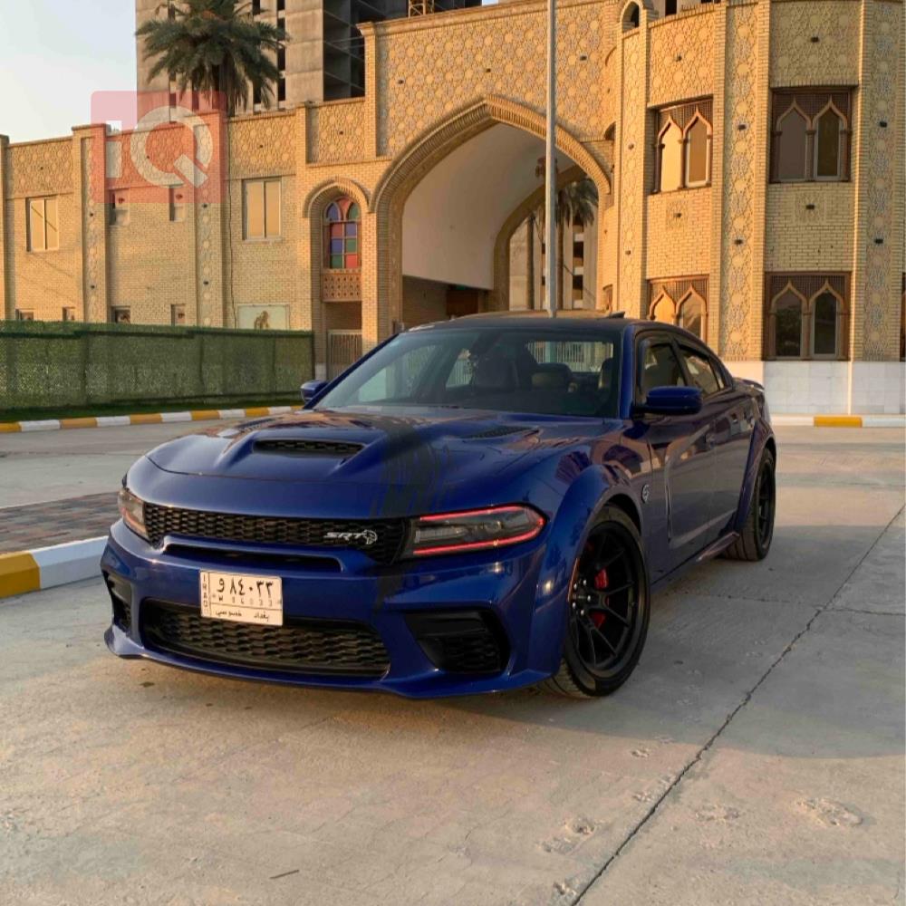 دۆج چارجەر